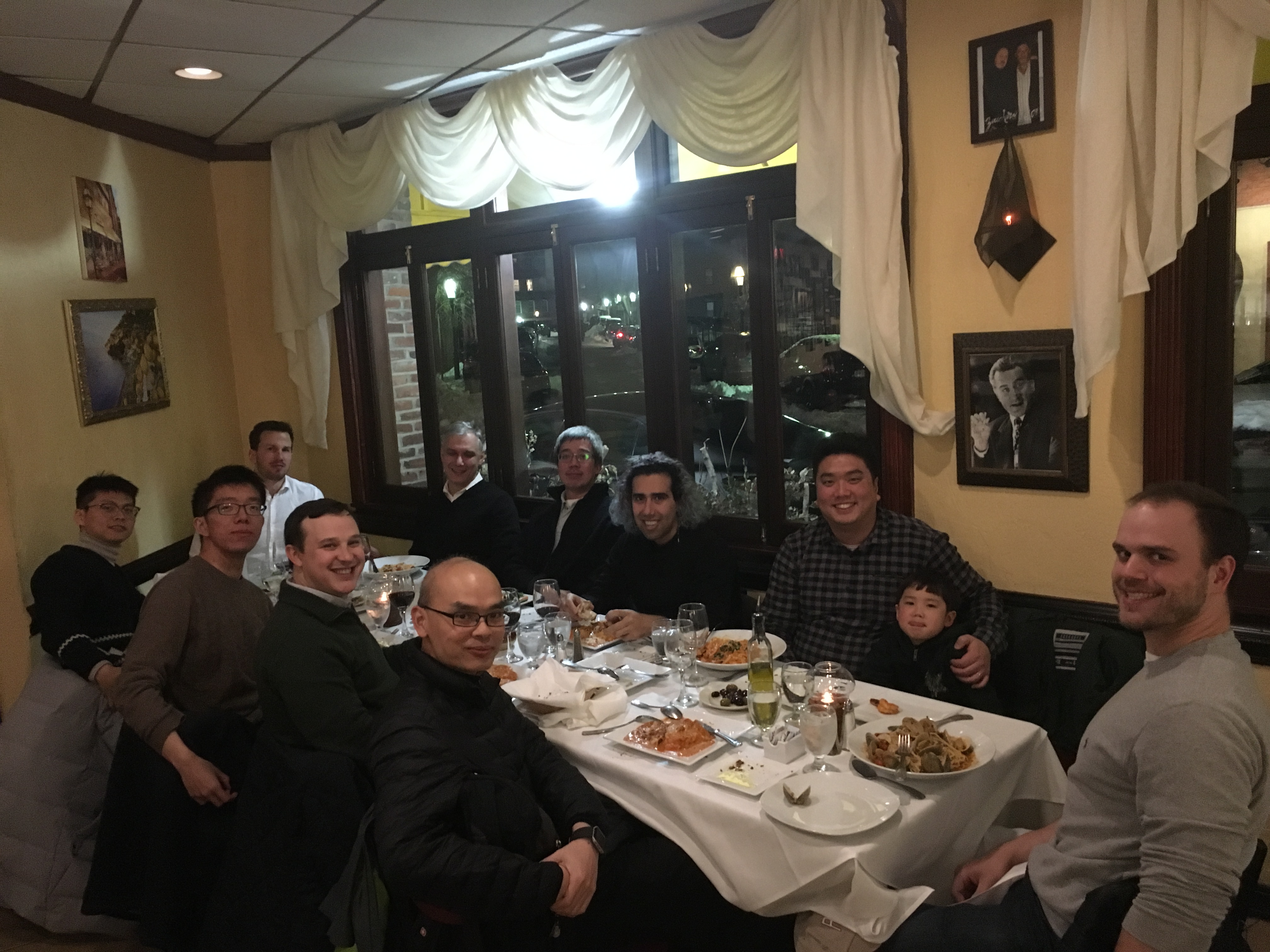 The Demkov group and sitting around a large table for dinner.