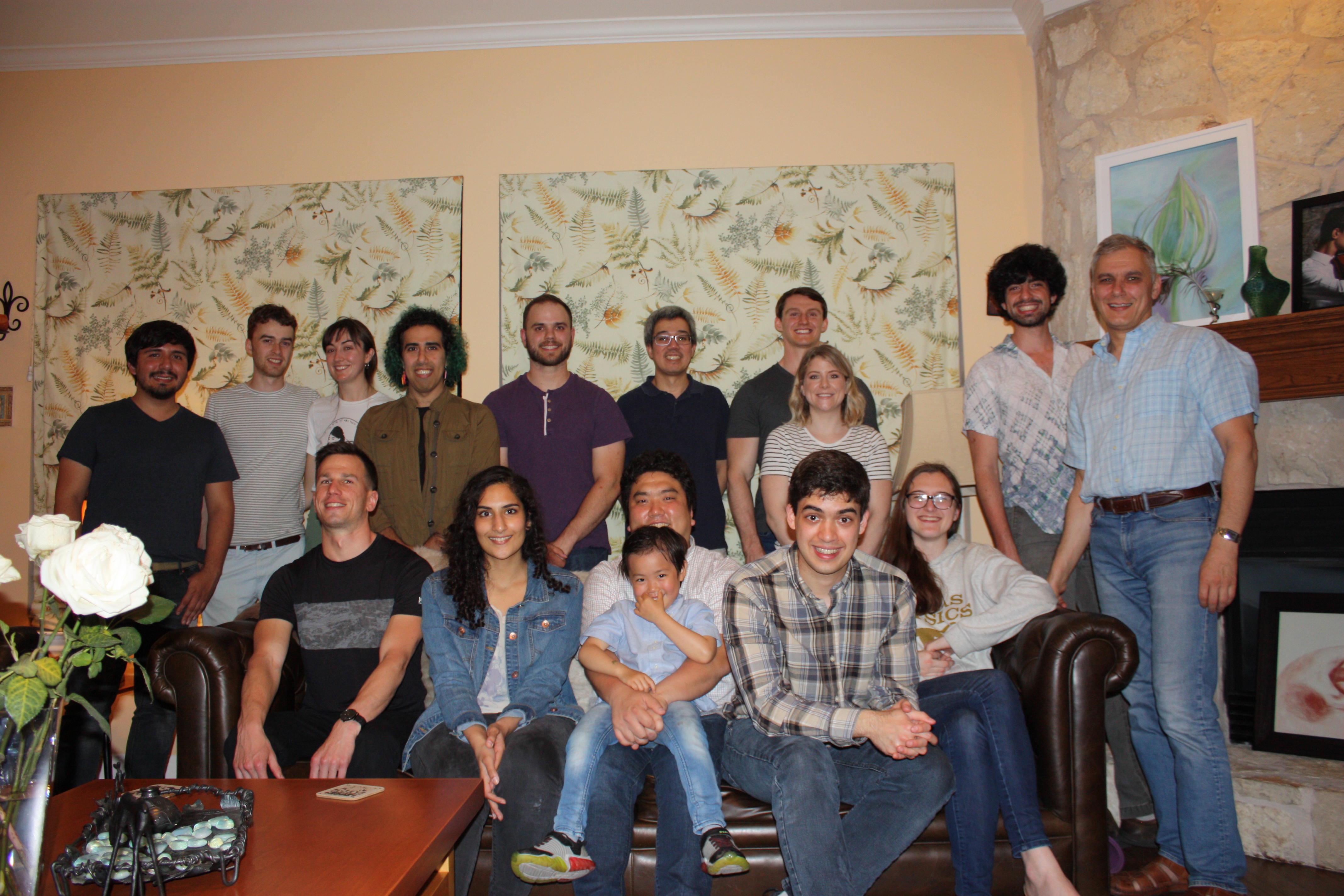 Group members and family and friends at Elliott's graduation party.